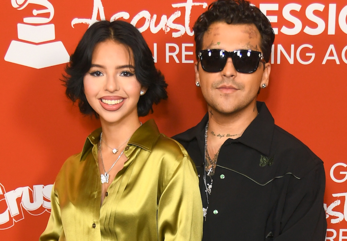 «Mía»: Christian Nodal presume a Ángela Aguilar en un sexy vestido rojo